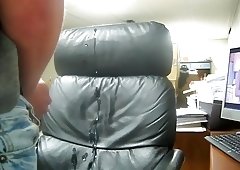 Fat cumshot on leather chair
