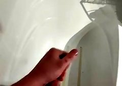 Stroking my big white cock and splashing on the wall